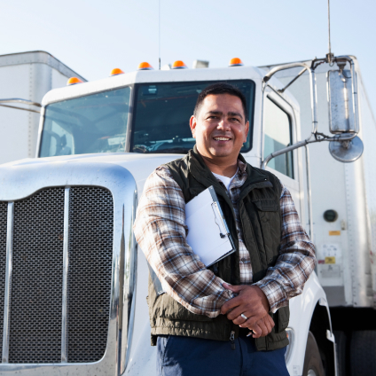 man in front of semi cab