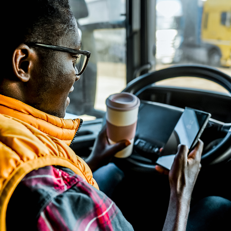 a truck driver using a smartphone