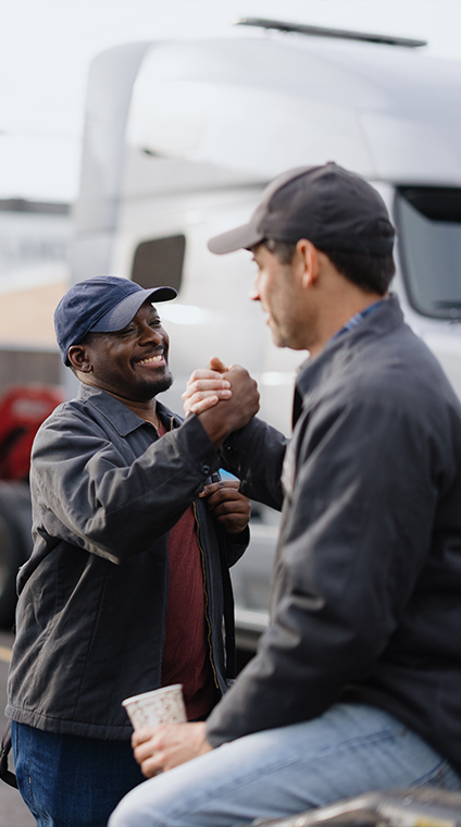 Truckers handshaking