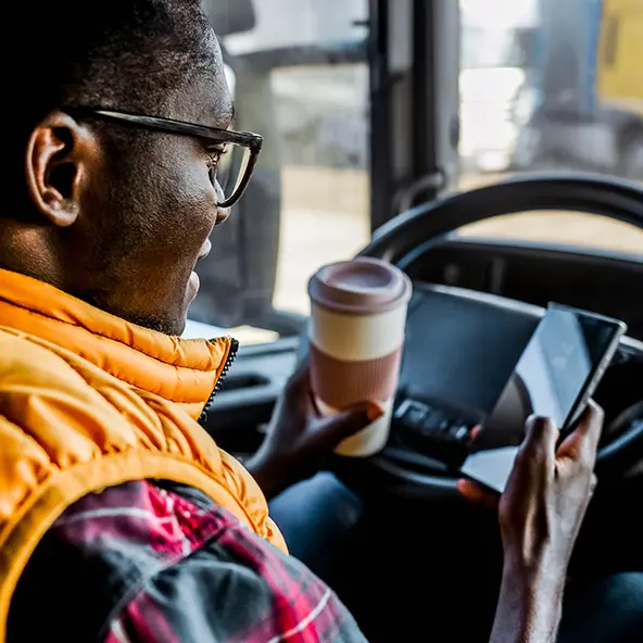 trucker looking at phone