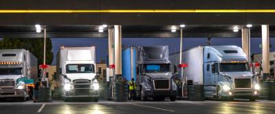 Trucks parked at a fuel station