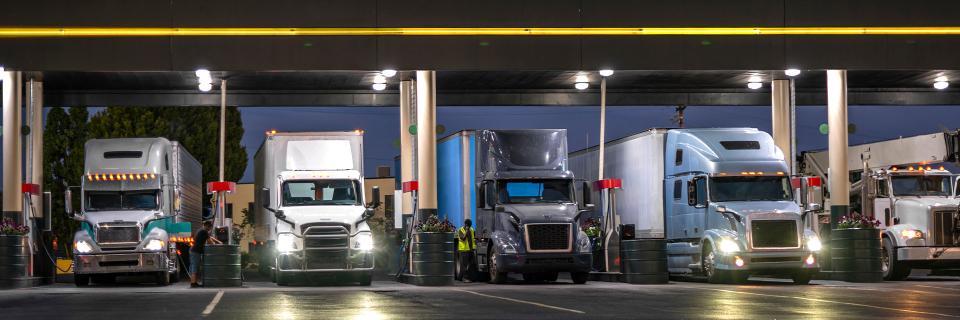 Trucks parked at a fuel station