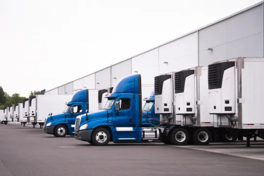 Trucks at a loading dock.