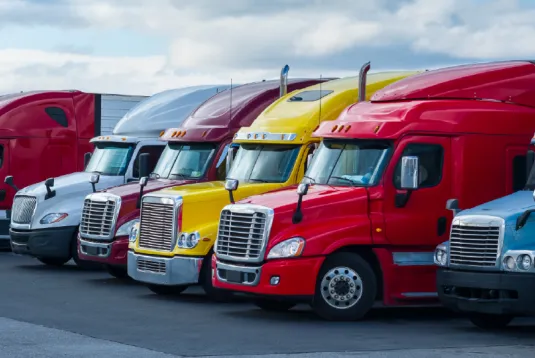 Trucks parked in a line.